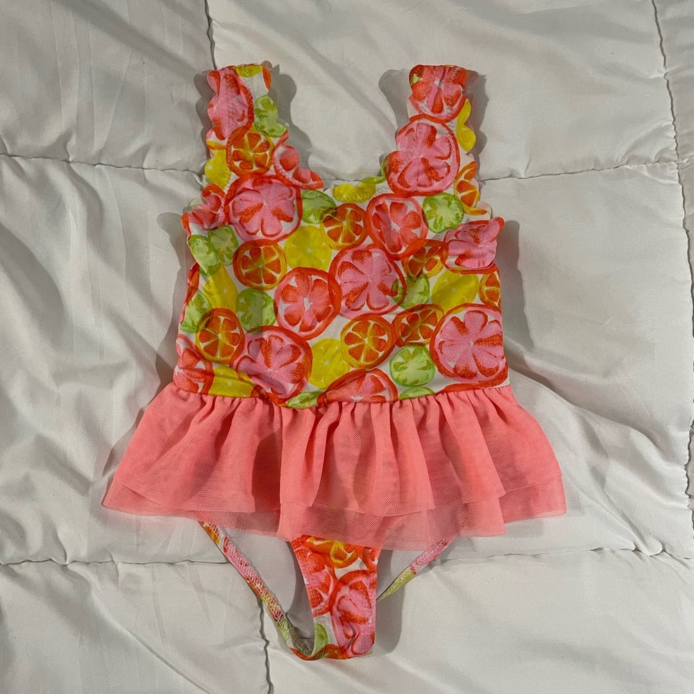 Penelope Mack citrus bathing suit with tulle skirt